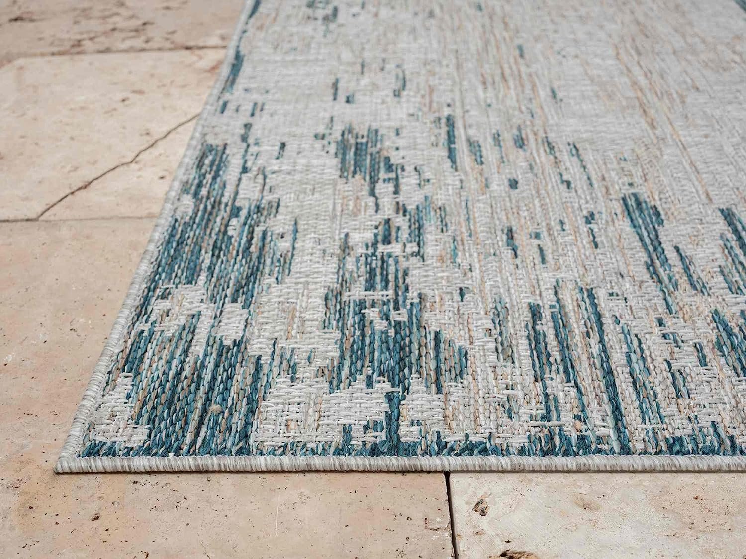 Abstract waterproof outdoor rug with neutral color tones