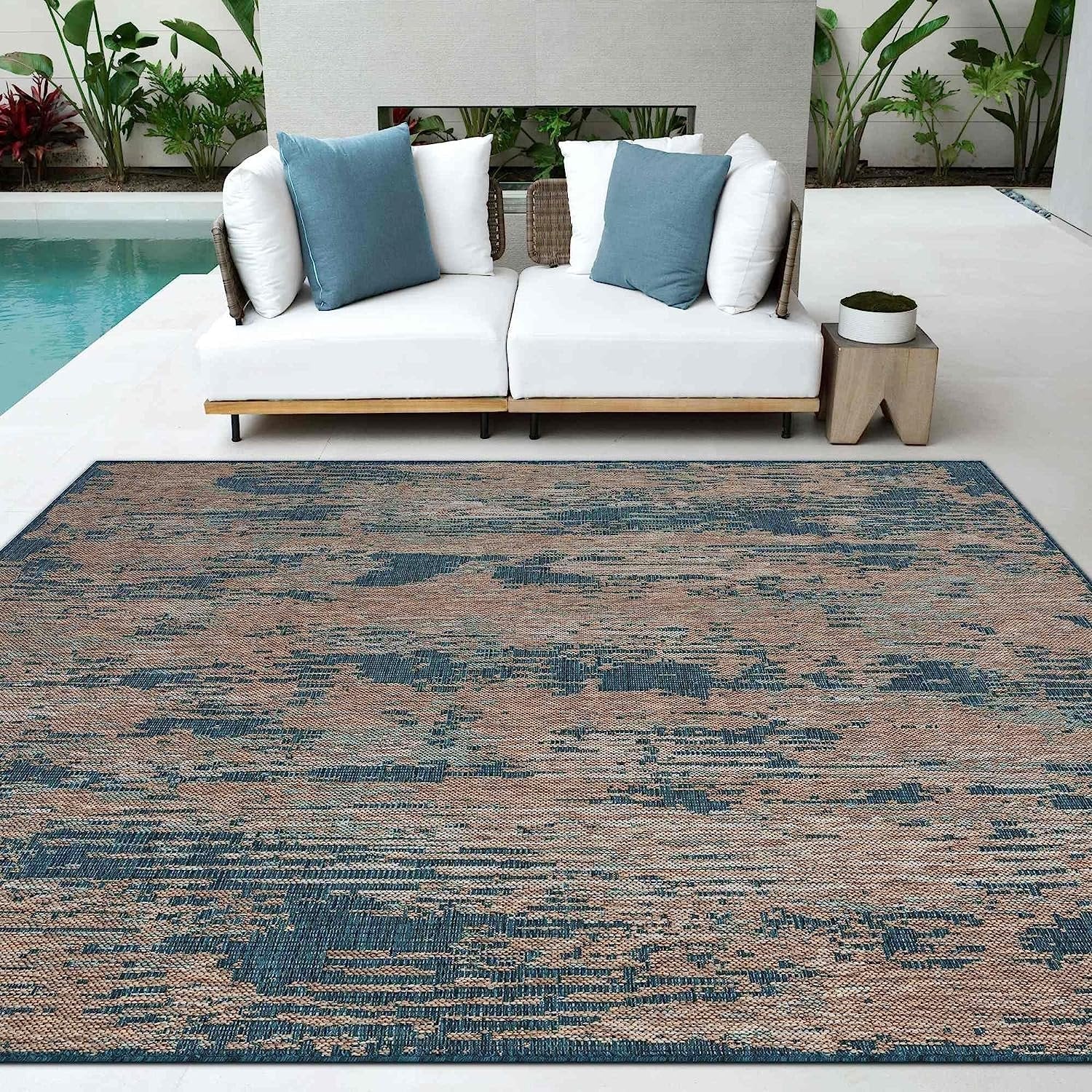 Abstract waterproof outdoor rug with neutral color tones